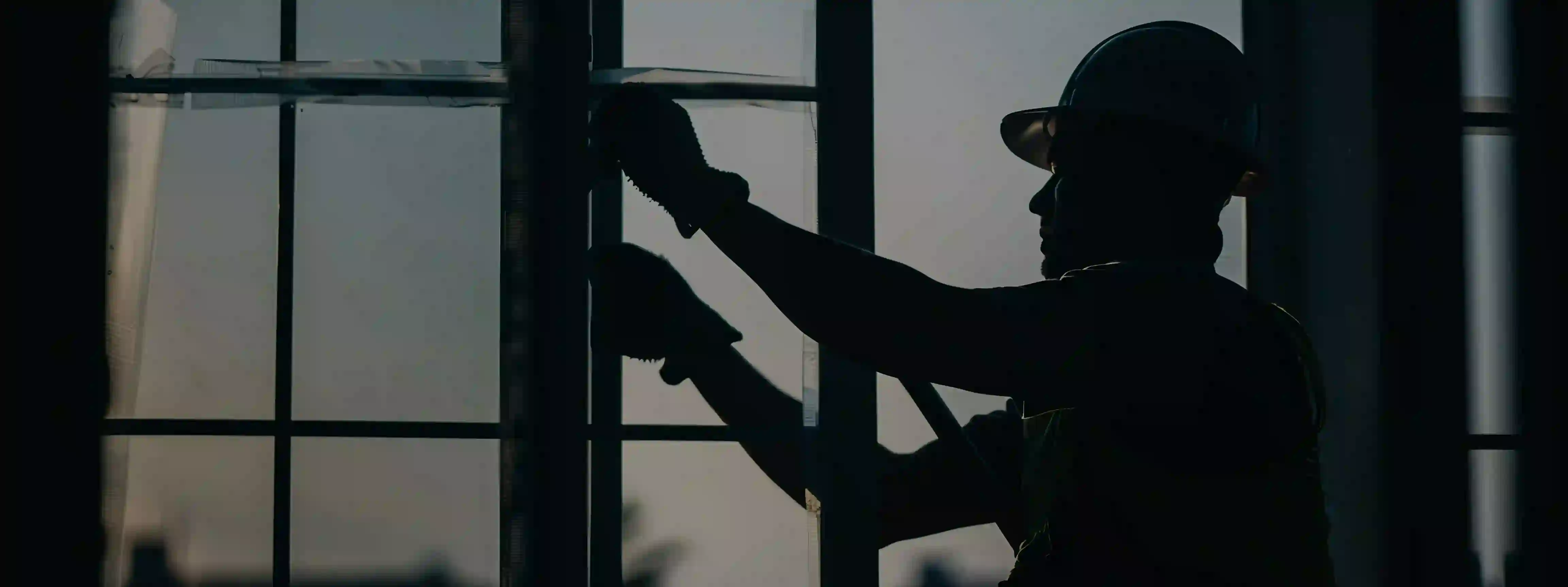 Worker Installing Window